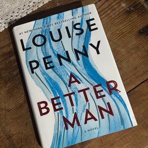 Louise Penny Novel with Blue and White Cover